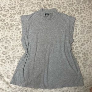 Women’s mock neck sleeveless top